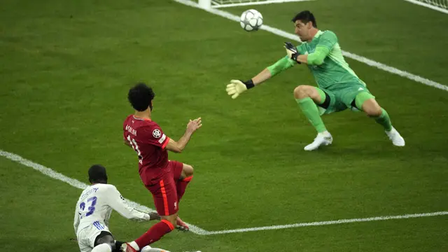 Foto: Gol Tunggal Vinicius Junior dan Apiknya Penampilan Thibaut Courtois Bawa Real Madrid Juara Liga Champions Musim 2021 / 2022