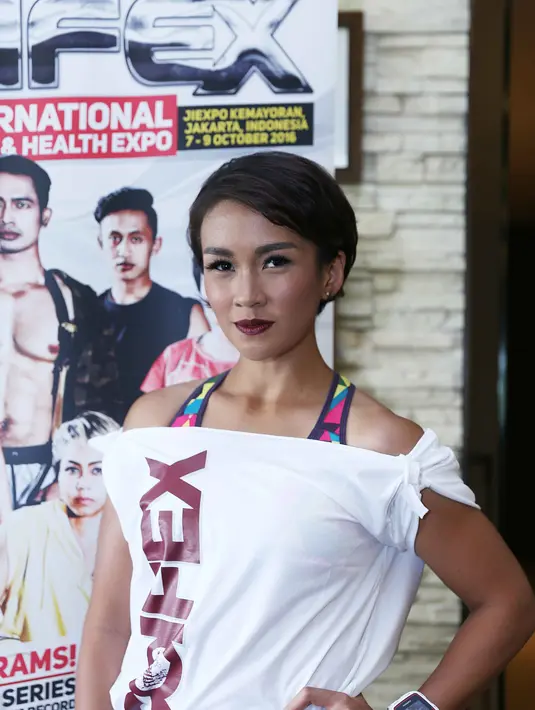 Semangat anaknya bangkit setelah anaknya berhasil menjadi juara saat mengikuti lomba lari. Itu yang membuat buah hatinya makin semangat. (Nurwahyunan/Bintang.com)