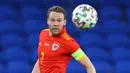 Banyak yang mengira jika Gareth Bale merupakan pemain dengan caps terbanyak di Timnas Wales untuk Piala Dunia 2022. Sayangnya hal tersebut salah. Pemain dengan jumlah caps terbanyak di Skuad The Dragons itu adalah Chris Gunter, yaitu 109 penampilan. Ia saat ini merupakan pemain AFC Wimbledon. (AFP/Geoff Caddick)