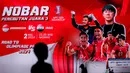 Para penonton meninggalkan tempat nonton bareng pertandingan perebutan juara ketiga Piala Asia U-23 2024 antara Timnas Indonesia U-23 melawan Irak U-23 di Kompleks Monumen Nasional (Monas), Jakarta, Kamis (03/05/2024). (Bola.com/Bagaskara Lazuardi)
