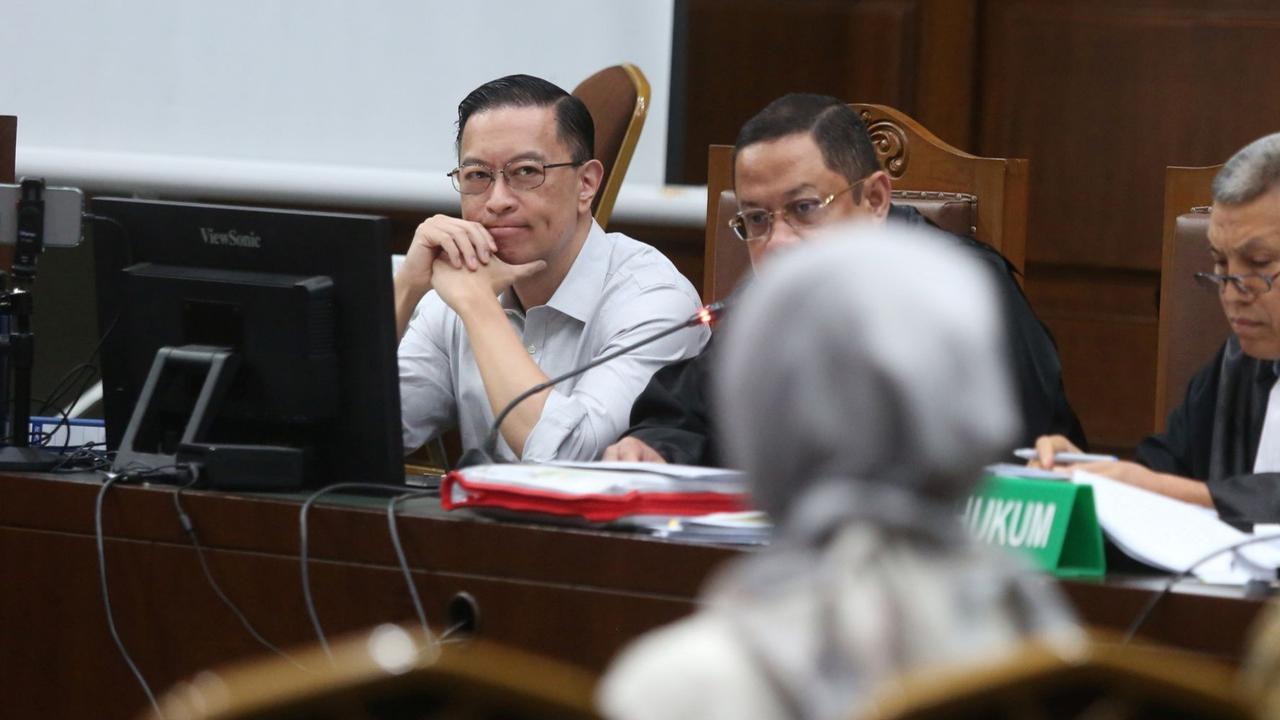 FOTO: Raut Tom Lembong Derngarkan Keterangan Saksi JPU di Sidang Kasus Impor Gula