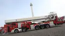 Deretan mobil kebakaran saat acara Upacara Perayaan Ulang Tahun Damkar ke-98, Jakarta Pusat, Rabu (1/3). Upacara itu turut diikuti oleh sekitar 1.000 petugas serta menampilkan sejumlah demo pemadaman. (Liputan6.com/Immanuel Antonius)