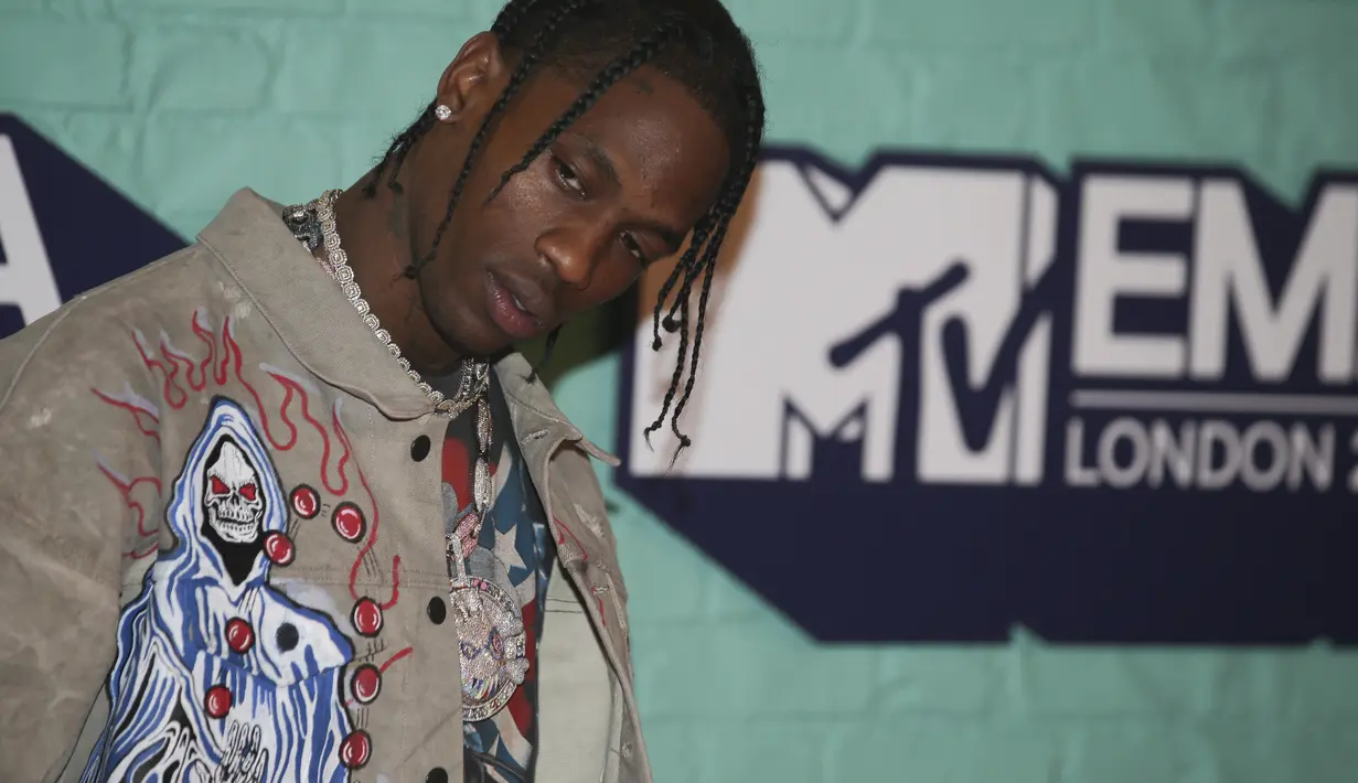 Travis Scott sendiri miliki sebuah lagu berjudul Butterfly Effect. (DANIEL LEAL-OLIVAS  AFP)