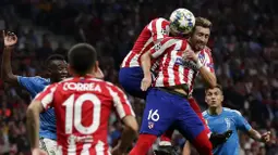 2. Pemain selanjutnya adalah gelandang milik Atletico Madrid, Hector Herrera (kanan atas). Pemain berusia 30 tahun ini didatangkan dari Porto musim lalu dengan bebas transfer. (Foto: AP/Manu Fernandez)