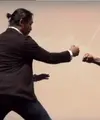 Pemeran utama dalam film Headshot, Sunny Pang dan Iko Uwais menunjukkan kebolehan pencak silat di pemutaran perdana Headsot TIFF 2016. Tepuk tangan meriah dari penonton setelah film selesai diputar. (dok. Screenplay)
