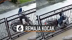 Aksi kocak diperlihatkan oleh remaja perempuan ini ketika berusaha menahan keseimbangan di atas motor.