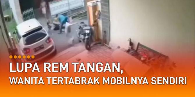 VIDEO: Lupa Rem Tangan, Wanita Tertabrak Mobilnya Sendiri di Depan Garasi