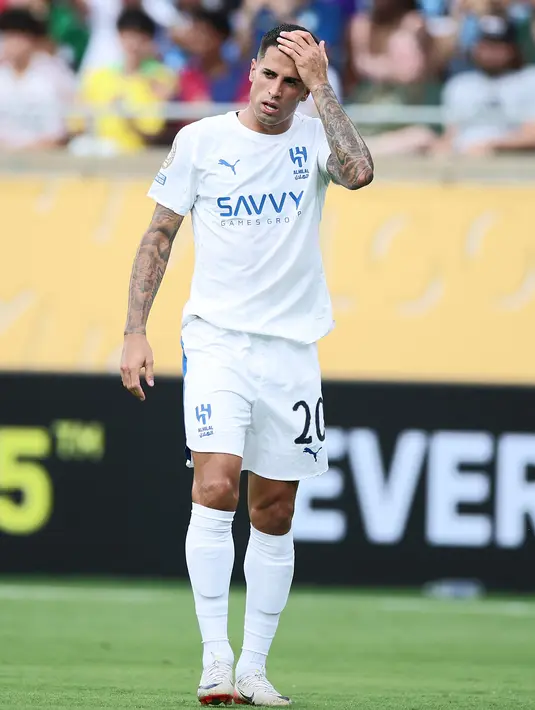 Joao Cancelo juga memilih jalan keluar demi menyelamatkan kariernya. Ia resmi kembali ke Barcelona dengan status pinjaman bulan lalu. (AFP/Alex Grimm)
