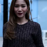 Untuk isu Bunga Zainal telah menikah dan telah memiliki dua anak, ia enggan berkomentar banyak. (Andy Masela/Bintang.com)