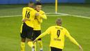 Pemain Borussia Dortmund merayakan gol yang dicetak Jadon Sancho ke gawang Club Brugge pada laga lanjutan Liga Champions di Signal Iduna Park, Rabu (25/11/2020) dini hari WIB. Borussia Dortmund menang 3-0 atas Club Brugge. (AFP/Leon Kuegeler/pool)