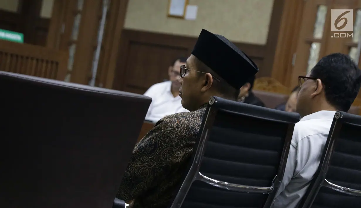 Menteri Agama, Lukman Hakim Syaifuddin jelang memberi keterangan sebagai saksi di Pengadilan Tipikor, Jakarta, Rabu (26/6/2019). Menag Lukman Hakim memberi keterangan sebagai saksi pada sidang lanjutan suap seleksi pengisian jabatan di Kementerian Agama. (Liputan6.com/Helmi Fithriansyah)