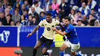 Marcus Rashford berebut bola dengan Eric Garcia dalam laga La Liga Spanyol antara Barcelona dan Real Oviedo di Stadion Carlos Tartiere - AP Photo/Jose Breton
