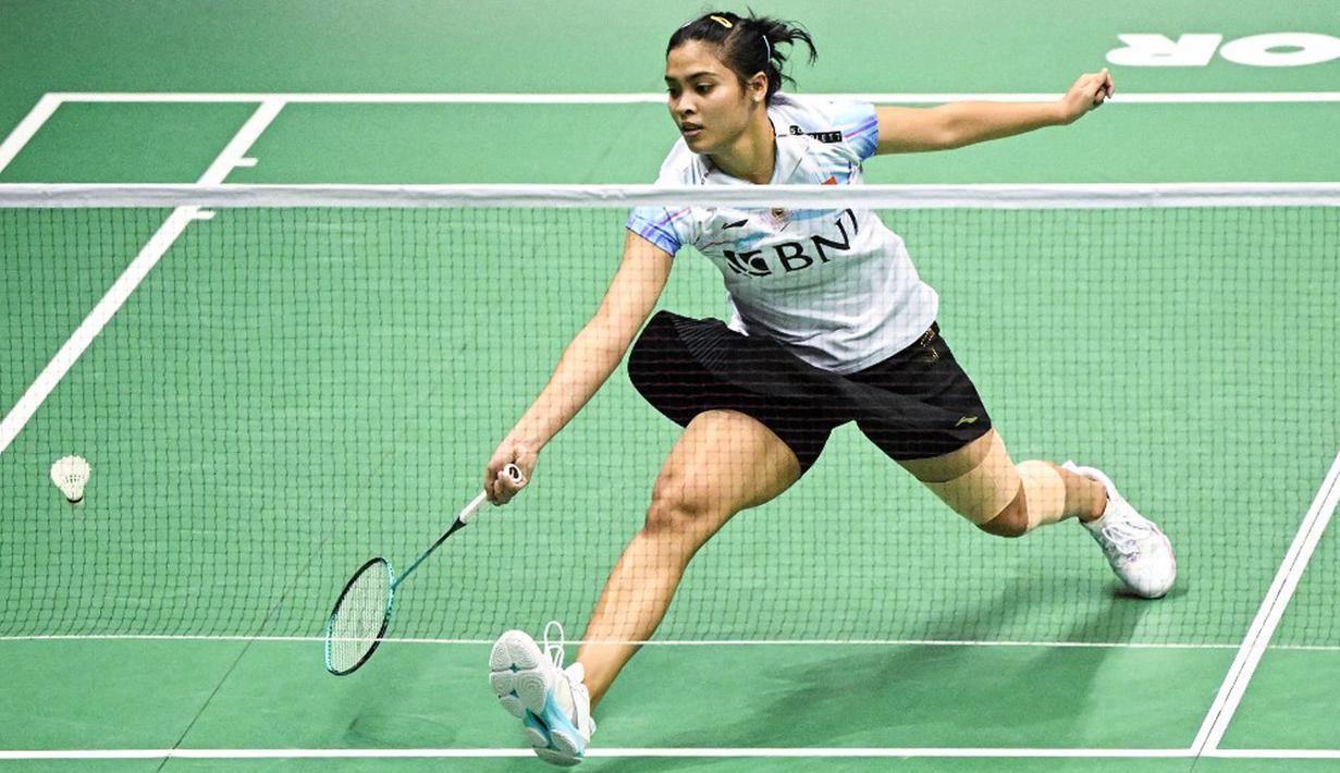 Gregoria Mariska Tunjung harus mengakui unggulan pertama asal Jepang itu lewat pertandingan rubber game selama 1 jam 10 menit. Dia kalah 17-21, 25-23, dan 18-21. (Peter PARKS/AFP)