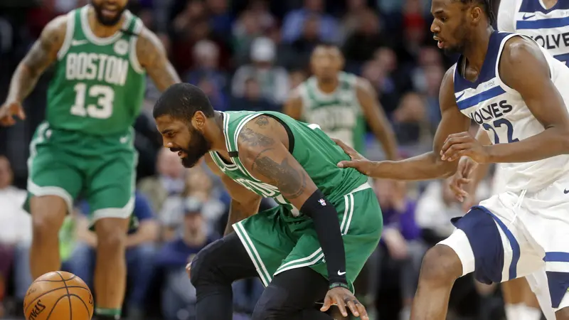 Aksi Kyrie Irving saat Celtics mengalahkan Timberwolves