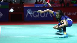 Tunggal putri Indonesia, Putri Kusuma Wardani, saat melawan wakil Jepang, Natsuki Nidaira, pada babak 16 besar Indonesia Masters 2024 di Istora Senayan Jakarta, Indonesia, Kamis (25/1/2024). Putri kalah dua gim langsung dengan skor 20-22 dan 16-21. (Bola.com/