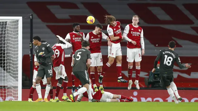 FOTO: Tertahan di Markas Arsenal, Manchester United Semakin Menjauh dari Manchester City di Puncak Klasemen