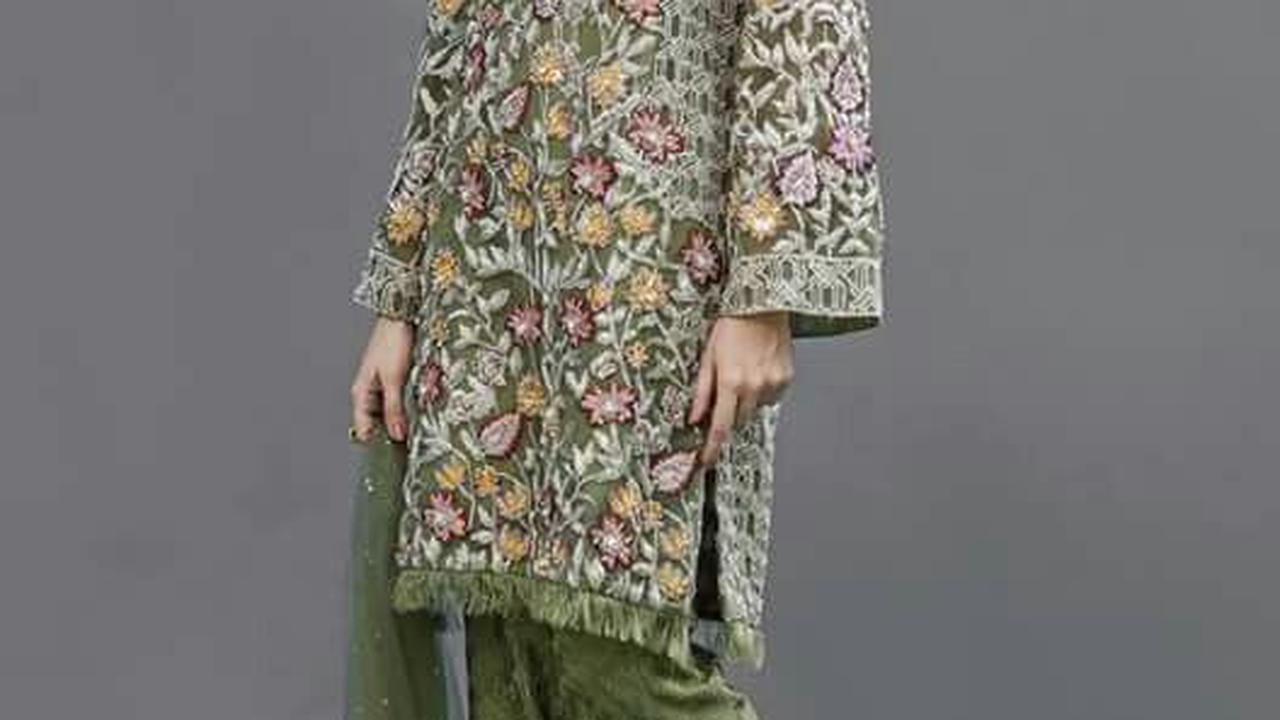 <b>Baju Kurung yang Dihiasi dengan Bordir</b>