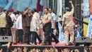 Presiden Prabowo Subianto juga akan membentuk Satgas Pemutusan Hubungan Kerja (PHK), meloloskan Rancangan Undang-Undang (RUU) Perlindungan Pekerja Rumah Tangga, serta terus memberantas korupsi di Indonesia. (Liputan6.com/Angga Yuniar)