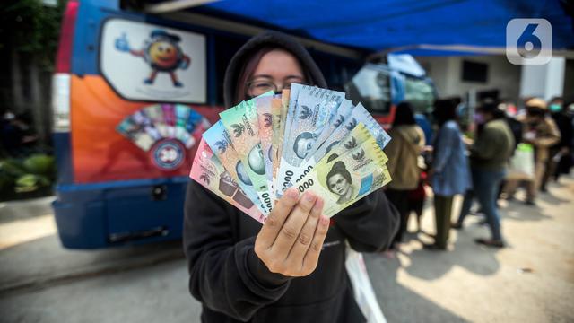 Antusiasme Warga Menukarkan Uang Rupiah Kertas Baru