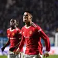 Penyerang Manchester United Cristiano Ronaldo merayakan golnya ke gawang Atalanta dalam pertandingan Grup F Liga Champions di Gewiss Stadium, Bergamo, Rabu, 3 November 2021. (Marco BERTORELLO / AFP)