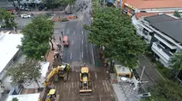 Perbaikan Jalan Raya Gubeng (Liputan6.com/Dian Kurniawan)