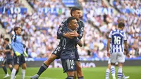 Real Madrid meraih kemenangan 2-1 atas Real Sociead pada laga pekan ke-4 La Liga di Estadio Municipal de Anoeta, Sabtu (13/9/2025) malam WIB. Satu dari dua gol Madrid dicetak Kylian Mbappe. (AP Photo/Miguel Oses)