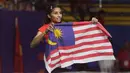 Tunggal Malaysia, Kisona Selvaduray, merayakan kemenangan atas Ruselli Hartawan pada laga final Bulutangkis di SEA Games 2019 di Multinlupa Sports Complex, Senin (9/12). Ruselli meraih perak setelah kalah dengan skor 22-20, 14-21 dan 13-21. (Bola.com/M Iqbal Ichsan)