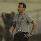 Pelatih Bali United, Widodo C. Putro, saat pertandingan melawan Madura United pada laga Piala Presiden di Stadion Manahan, Solo, Sabtu, (3/2/2018). Bali United menang adu penalti 5-4 atas Madura United. (Bola.com/M Iqbal Ichsan)