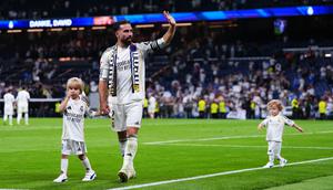 Dani Carvajal melakoni laga terakhirnya bersama Real Madrid ketika bersua Athletic Bilbao pada pekan terakhir La Liga musim ini di Santiago Bernabeu, Minggu (24/05/2026) dini hari WIB. Dalam duel tersebut, El Real memetik kemenangan 4-2 atas Bilbao. (AP Photo/Manu Fernandez)
)