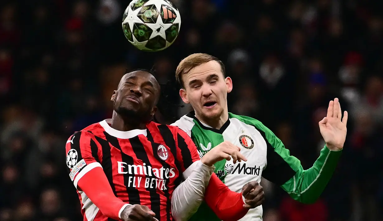 Membutuhkan dua gol tanpa balas untuk memastikan langkah ke babak 16 besar, AC Milan justru tersingkir setelah hanya mampu bermain imbang saat menjamu Feyenoord. (Marco BERTORELLO/AFP)