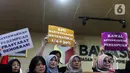 Peserta aksi menganggap pasal tersebut bermasalah karena dapat mematikan upaya peningkatan keterwakilan perempuan dan pencalonan DPR serta DPRD. (Liputan6.com/Herman Zakharia)