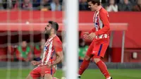 Penyerang Atletico Madrid, Diego Costa, merayakan gol ke gawang Sevilla pada menit ke-29 dalam laga pekan ke-25 La Liga Spanyol di Estadio Ramos Sanchez Pizjuan, Minggu (25/2/2018). (AFP/Cristina Quicler)