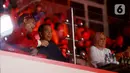 <p>Presiden RI, Joko Widodo didampingi Ibu Negara Iriana Jokowi dan Menpora RI, Dito Ariotedjo, menyaksikan pertandingan tunggal putra Indonesia, Anthony Sinisuka Ginting, melawan wakil dari China Li Shi Feng pada laga semi final Indonesia Open 2023 di Istora Senayan, Sabtu, (17/06/2023). Anthony Ginting menang dengan skor 21-17 dan 21-15. (Bola.com/M Iqbal Ichsan)</p>