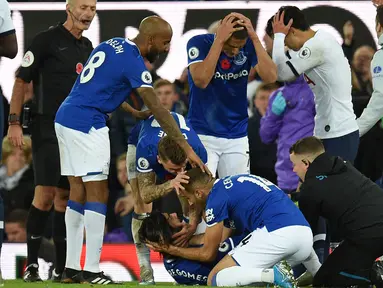 Penyerang Tottenham Hostspur, Son Heung-min sempat menjadi perbincangan hangat usai melakukan tekel horor kepada gelandang Everton, Andre Gomes yang membuat engkel kaki kanan Gomes mengalami dislokasi. (AFP/Oli Scarff)
