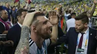 Ekspresi kapten Argentina, Lionel Messi merayakan kemenangan timnya atas tuan rumah Brasil pada lanjutan Kualifikasi Piala Dunia 2026 di Stadion Maracana, Rio de Janeiro, Rabu (22/11/2023). (AP Photo/Silvia Izquierdo)