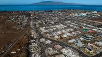 Para warga negara Indonesia (WNI) yang berada di Hawaii dilaporkan masih aman. Mayoritas WNI juga tidak tinggal di Maui yang merupakan lokasi pusat kebakaran. (AP Photo/Jae C. Hong)