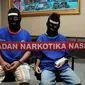 Badan Narkotika Nasional (BNN) menahan dua Disc Jockey (DJ) yang diduga terlibat peredaran narkotika di Jakarta, (15/9/2014). (Liputan6.com/Helmi Fithriansyah)