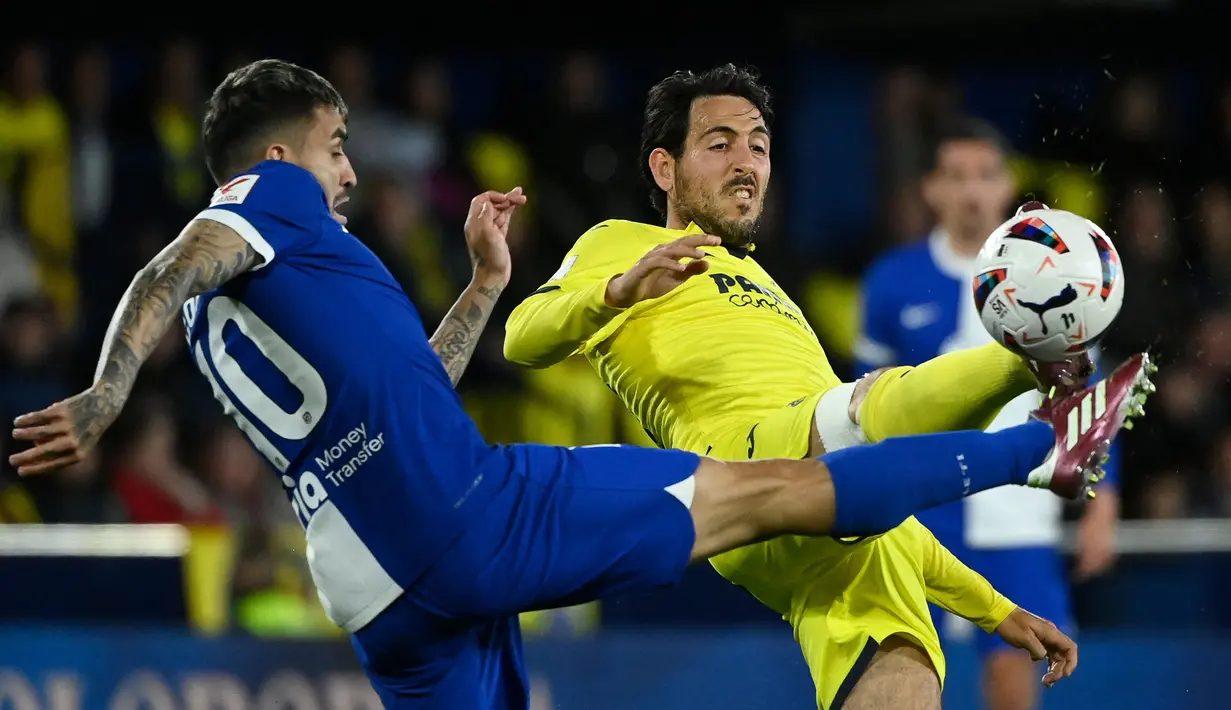 Bertandang ke Stadion La Ceramica, Atletico Madrid menang tipis 2-1 atas Villarreal. (JOSE JORDAN/AFP)