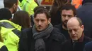 Mantan pemain AS Roma, Francesco Totti tiba menghadiri upacara pemakaman Davide Astori di Florence, Italia, Kamis (8/3). Davide Astori meninggal pada usia 31 tahun di kamar hotel setelah terkena serangan jantung. (AP Photo/Filippo Monteforte)