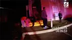 Detik-detik seorang bocah melompat dari lantai dua apartemen yang terbakar.