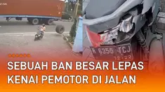 Rekaman CCTV menunjukkan sebuah ban besar lepas dan mengenai pemotor di jalan.