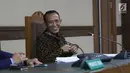 Mantan Menteri Agama Suryadharma Ali saat menjalani sidang lanjutan PK di PN Jakarta Pusat, Rabu (25/7/2018). Dalam kesimpulannya, Suryadharma Ali meminta majelis hakim membebaskan dirinya dari hukuman penjara. (Liputan6.com/Helmi Fithriansyah)