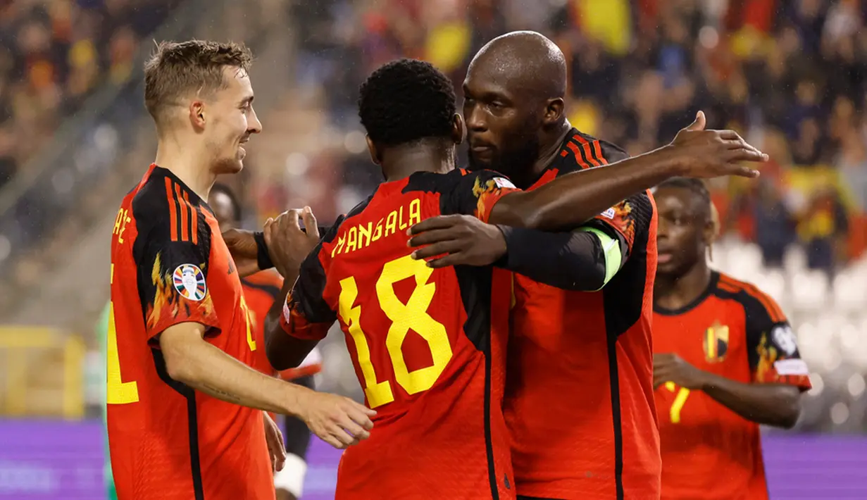 Belgia menyelesaikan fase grup dengan memuncaki klasemen Grup F, mereka unggul satu poin atas Austria. Kedua klub itu telah memastikan tiket ke Jerman dengan satu pertandingan tersisa. (AP Photo/Geert Vanden Wijngaert)