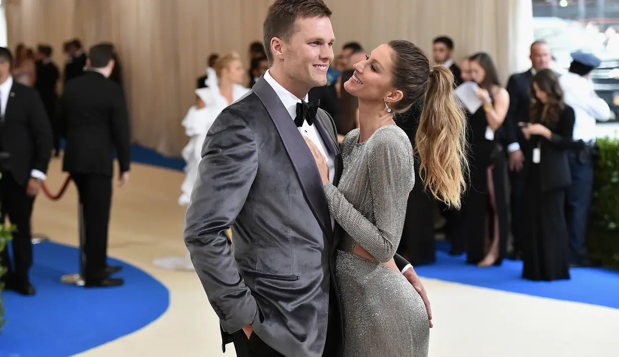 Gisele Bundchen tahu bahwa Tom Brady adalah jodohnya saat pertama bertemu. (MIKE COPPOLA / GETTY IMAGES NORTH AMERICA / AFP)
