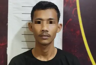 Polisi meringkus buronan anak punk bernama Dias Dwi Saputra (26) yang mengeroyok seorang pedagang di Kota Metro, Lampung. (Liputan6.com/Istimewa).