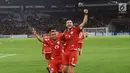 Pemain depan Persija, Marko Simic bersama Riko Simanjuntak merayakan gol ke gawang Tampines Rovers pada penyisihan grup H Piala AFC 2018 di Stadion GBK, Jakarta, Rabu (28/2). Persija unggul 4-1. (Liputan6.com/Helmi Fithriansyah)