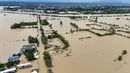 Foto udara menunjukkan rumah-rumah yang terendam banjir akibat hujan lebat yang disebabkan oleh Badai Tropis Trami di Kota Tuguegarao, provinsi Cagayan, Filipina pada Jumat 25 Oktober 2024. (John Dimain/AFP)