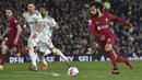 Striker Liverpool, Mohamed Salah menggiring bola untuk mencetak gol ke gawang Leeds United pada laga Liga Inggris 2022/2023 di Elland Road, Leeds (17/4/2023). Mohamed Salah menjadi opsi yang ideal bagi PSG karena kapasitasnya yang mirip dengan Lionel Messi. Selain dianugerahi dengan kemampuan kaki kiri yang mumpuni, keduanya juga kerap jadi pembeda dalam sebuah laga. Terikat kontrak hingga 2025, ia dibanderol 80 juta euro bagi klub peminat. (AP Photo/Rui Vieira)