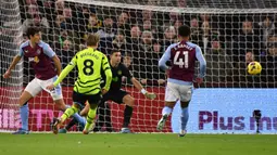 Arsenal harus rela kehilangan puncak klasemen Liga Inggris usai kalah 0-1 dari Aston Villa pada pekan ke-16 Liga Inggris. Gol tunggal Aston Villa dicetak John McGinn. (AP Photo/Rui Vieira)