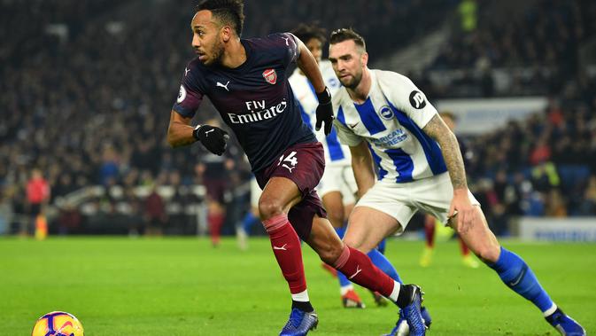 Pierre-Emerick Aubameyang mencetak gol pembuka Arsenal pada laga melawan Brighton. (AFP/Glyn Kirk)